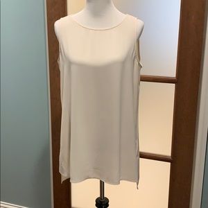 Cream sleeveless blouse size large